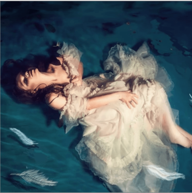 SWAiNSONG’s “Under Glass”: A Melancholic Overture in Shades of&nbsp;Reflection